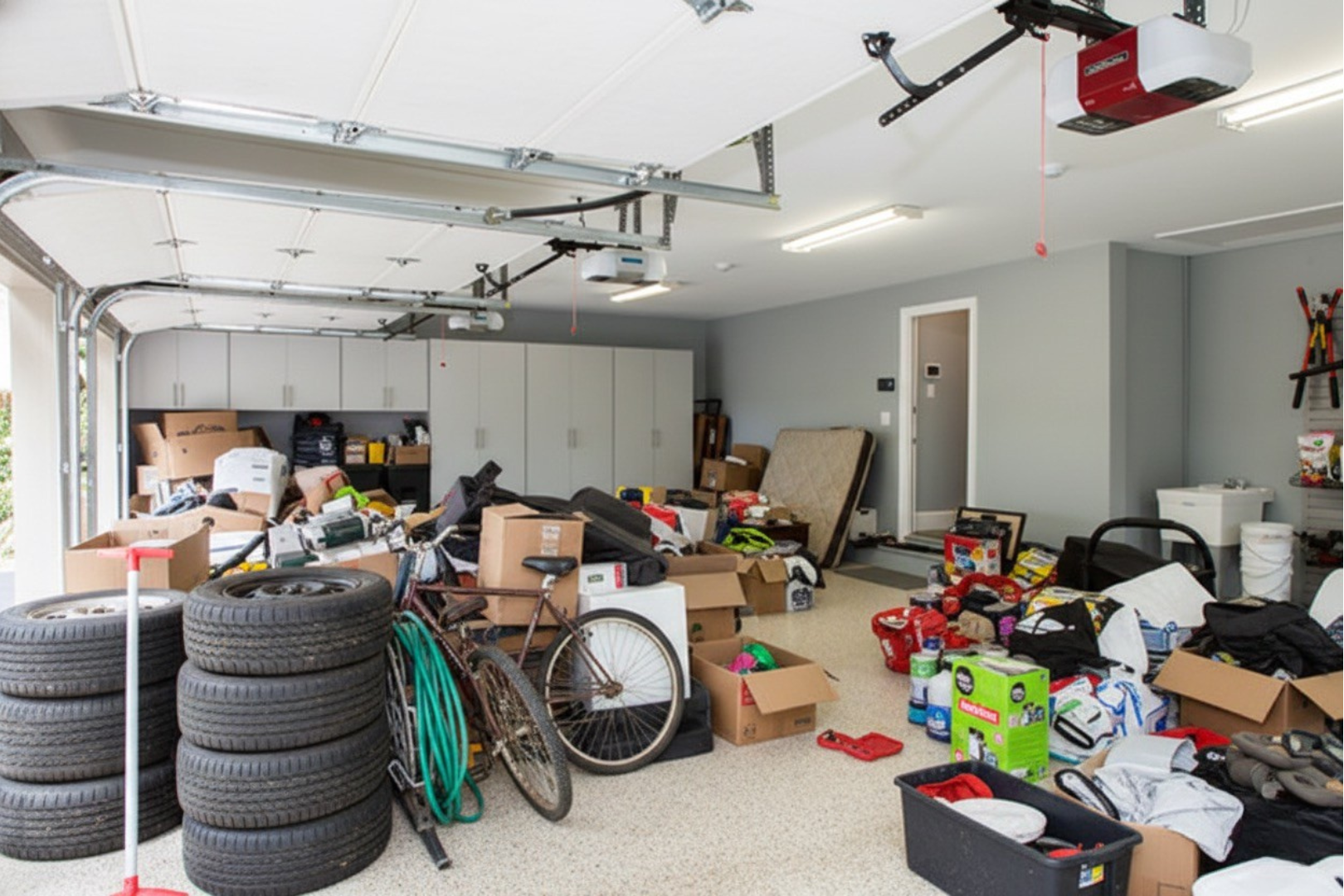 Before: cluttered garage space